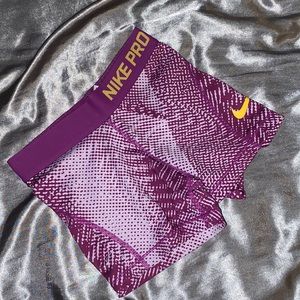 Purple children’s Nike pros